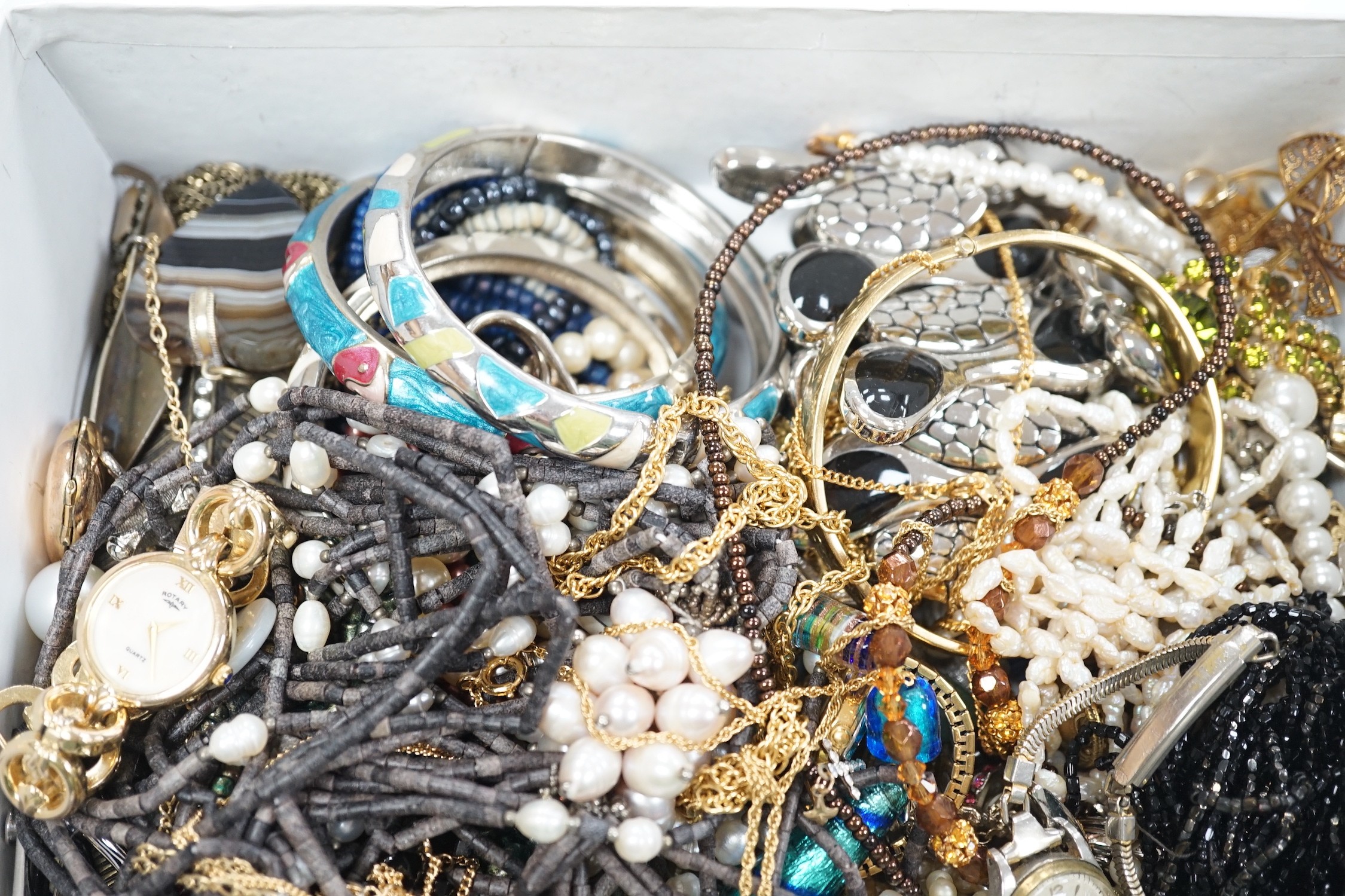 Assorted costume jewellery, including 9ct back and front locket, compass pendant, necklaces etc.